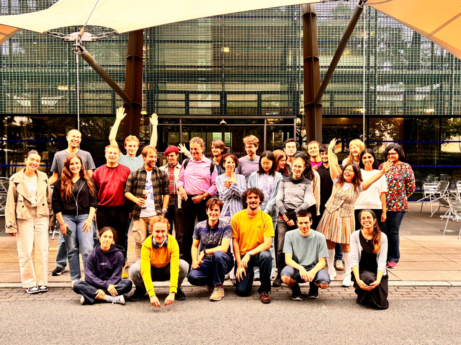 DresdenDIR participants gathered outside the institute under shade sails